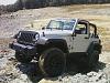 Click image for larger version

Name:	jeep rock.jpg
Views:	182
Size:	85.0 KB
ID:	333091