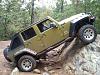 Click image for larger version

Name:	jeep poser rock.JPG
Views:	185
Size:	41.3 KB
ID:	389143