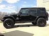 Click image for larger version

Name:	2011_jeep_wrangler_unlimited_sahara_black_loaded__hard_top_lift_tv__s_11_lgw.jpg
Views:	125
Size:	294.5 KB
ID:	663353