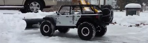 Remote Control JK Rubicon Goes to Work Plowing Driveway