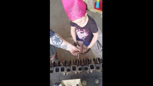 Five-Year-Old Girl Helps Dad Tear Down Jeep Engine