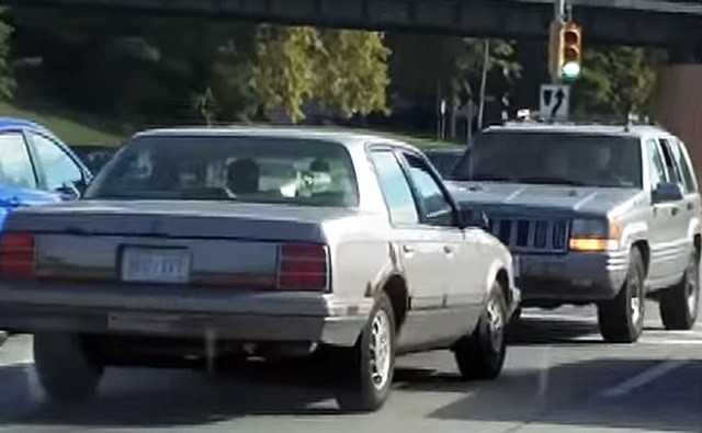 Jeep Driver Taunts Car While Going 45 MPH in Reverse