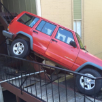Jeep Cherokee XJ Rock Crawls an Apartment Building