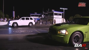 Jeep SRT8 Runs Down Charger at the Strip
