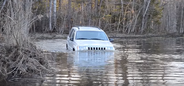Watch This Diesel Jeep Emerge From the Deep