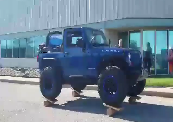 Check Out This Jeep Balancing Act on Four Logs