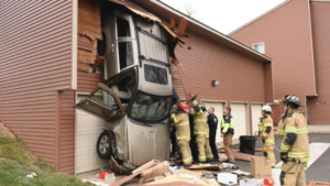 Jeep Takes a Nose Dive From Second-Story Garage