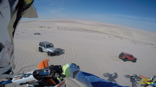 Dirt Bike Accidentally Lands on Jeep After 100-Foot Jump