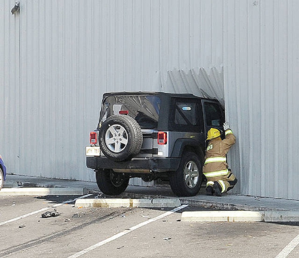 jk-forum.com Jeep Wrangler Crashes Into Bookstore