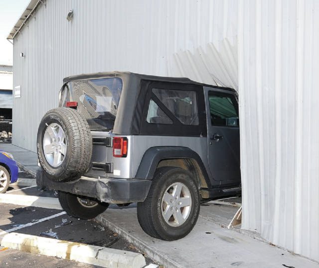 jk-forum.com - Jeep Wrangler Crashes Into Bookstore