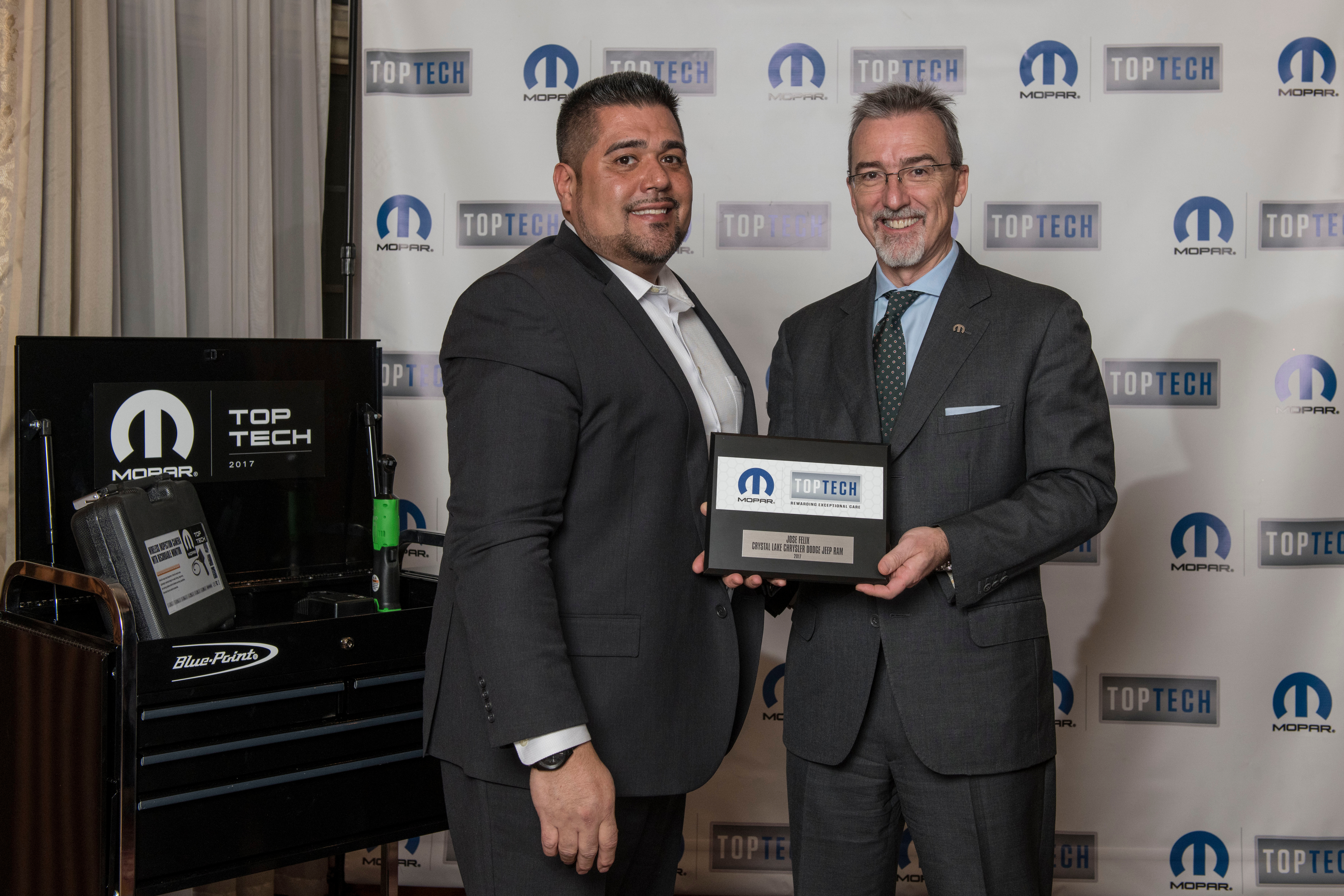 Pietro Gorlier (right), Head of Parts and Service (Mopar), FCA, presents Jose Felix, a technician at Crystal Lake Chrysler Jeep® Dodge Ram in Illinois, with a Mopar “Top Tech” award. The program recognizes elite dealership technicians, with only 100 Mopar “Top Tech” award winners chosen from more than 26,000 eligible candidates.