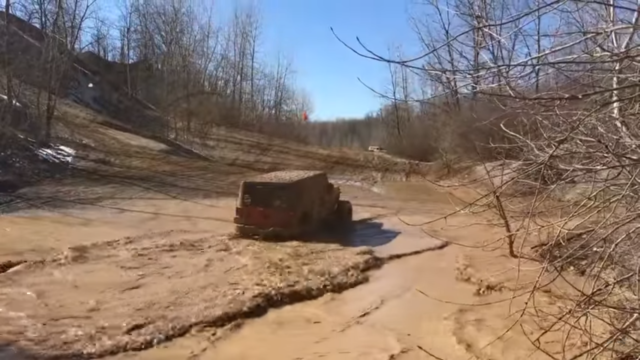 Off-Road Fail: Guy Floods Jeep Engine in a Bog Run