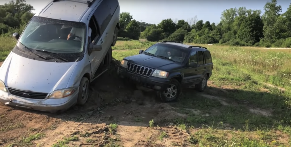 Jeep Grand Cherokee Tries to 'Rescue' a Stuck Van