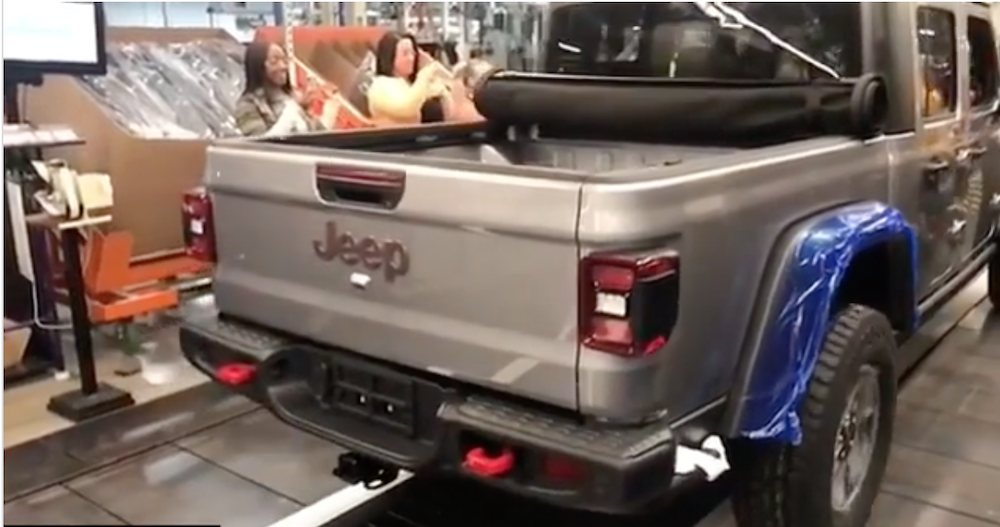 The first Jeep Gladiator rolls off the production line. 
