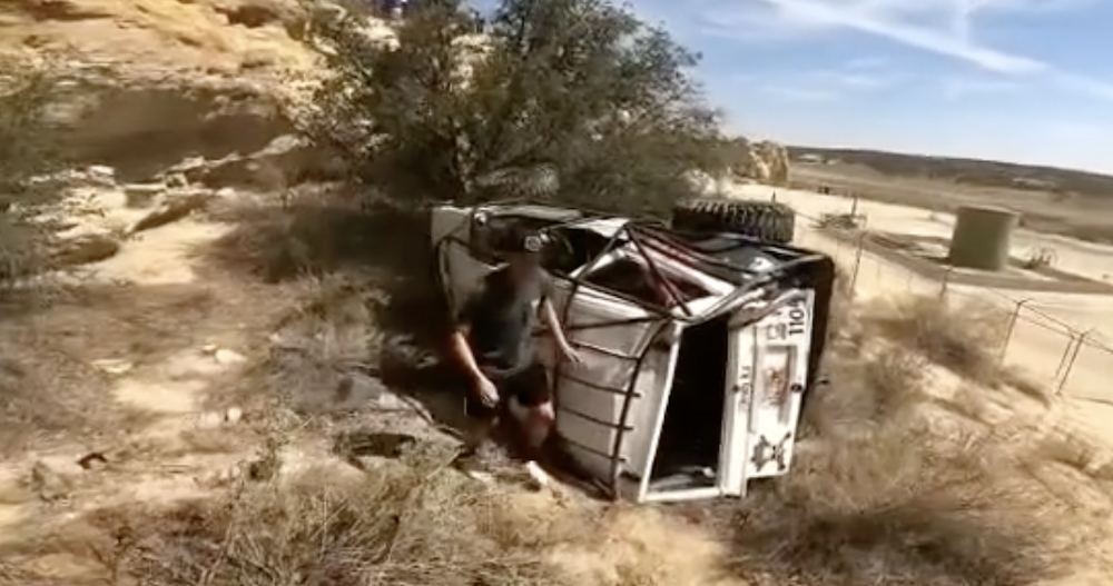 Jeep Cherokee XJ Rolls Off Rocks