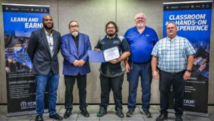 Native American student Camron Slaton (center) of Oklahoma State University Institute of Technology in Okmulgee, Oklahoma, is a recipient of one of three Mopar Career Automotive Program (CAP) scholarships. Shown in a recent ceremonial event, Slaton will receive up to $20,000 reimbursements for necessary tools and two years of tuition to become an automotive service technician.